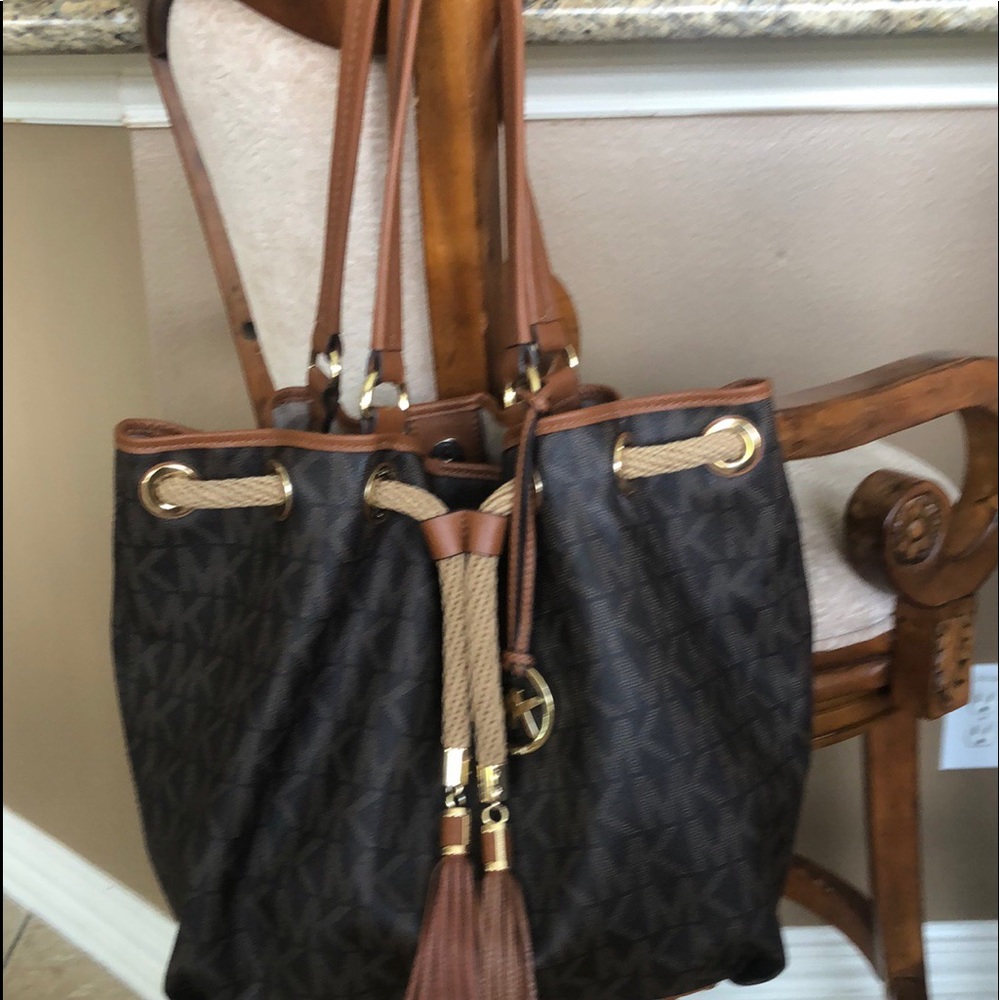 Authentic Michael Kors tote bag with tassels